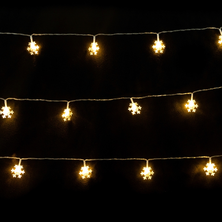 Aigostar - LED božični niz 10xLED/3xAA 1,5 m, topla bela, snežinke