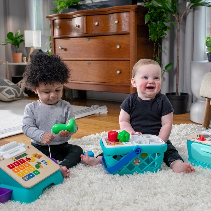 Baby Einstein - Otroška interaktivna nakupovalna košara MAGIC TOUCH HAPE