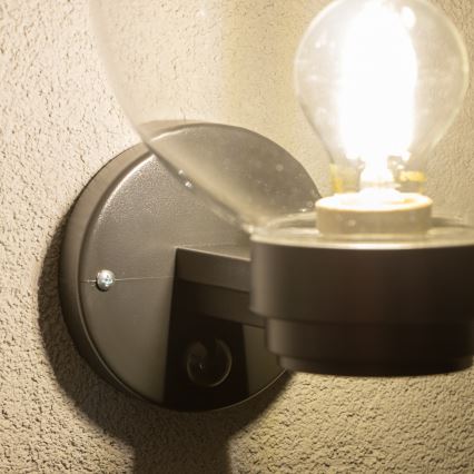 Brilagi - Zunanja stenska svetilka HARBOR s senzorjem gibanja 1xE27/40W/230V IP33 črna/prosojna