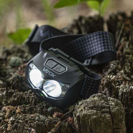 LED Zatemnitvena polnilna naglavna svetilka s senzorjem in rdeča luč 2xLED/5W/5V/3xAAA IP65 500 sijajni 1200 mAh