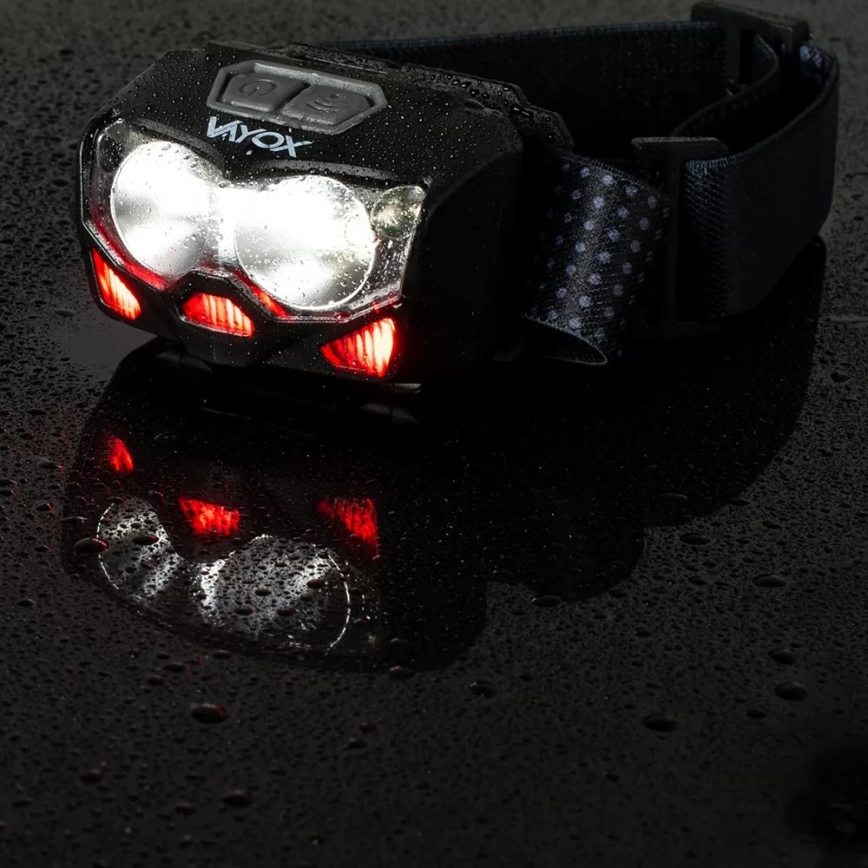 LED Zatemnitvena polnilna naglavna svetilka s senzorjem in rdeča luč 2xLED/5W/5V/3xAAA IP65 500 sijajni 1200 mAh