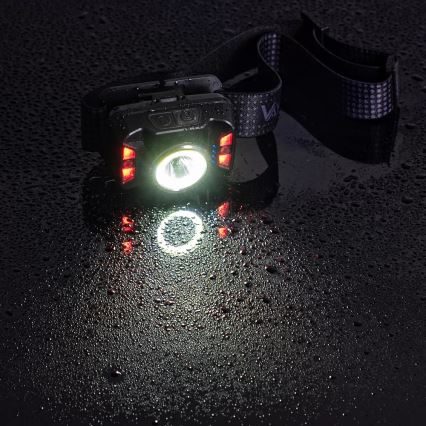 LED Zatemnitvena polnilna naglavna svetilka s senzorjem in rdeča luč LED/15W/5V IP66 430 sijajni 1800 mAh