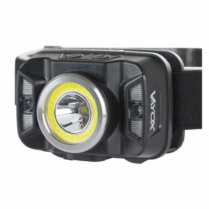 LED Zatemnitvena polnilna naglavna svetilka s senzorjem in rdeča luč LED/15W/5V IP66 430 sijajni 1800 mAh