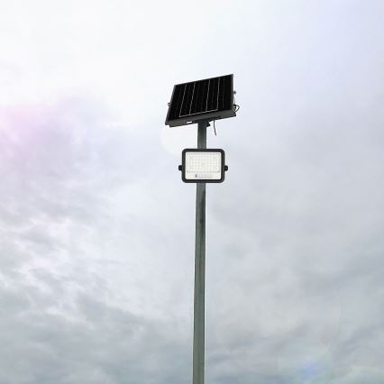 Zatemljiv LED solarni reflektor LED/100W/3,2V 2000-8000K IP65 5000 mAh črna + daljinski upravljalnik