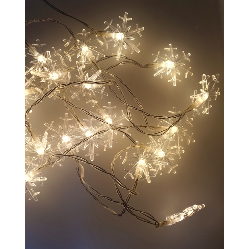 LED zunanja božična veriga 20×LED/2×AA, 2,2 m, IP44, topla bela, v obliki snežink