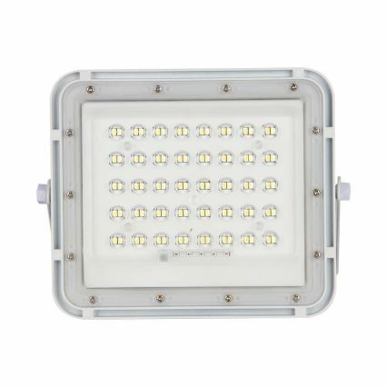 LED Zunanja zatemnitvena solarna reflektor LED/10W/3,2V IP65 4000K 6000 mAh bela + Daljinski upravljalnik