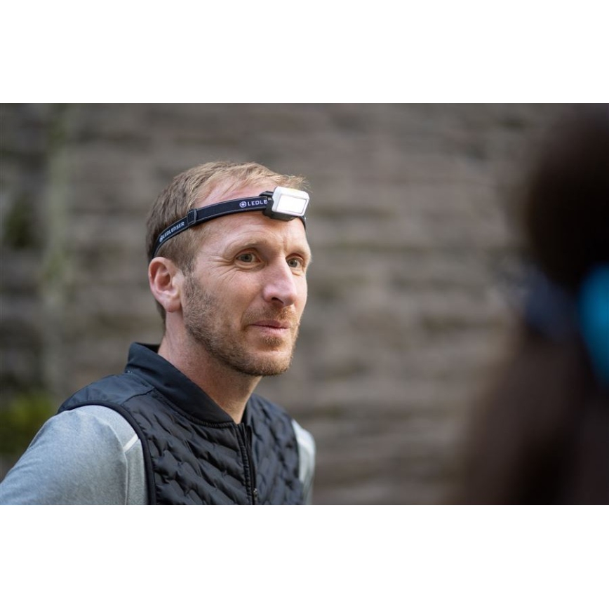 Ledlenser NEO5R - zatemnjevalna polnilna LED naglavna svetilka 1800 mAh IP54 600 lm 35 h črna/bela