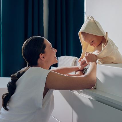 Lionelo - Otroška mušelinska brisača s kapuco Bež cappuccino