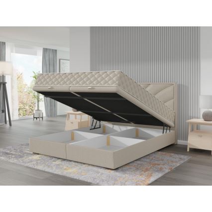 Oblazinjena postelja z vzmetnicami in prostorom za shranjevanje GINA 180x200 cm bež
