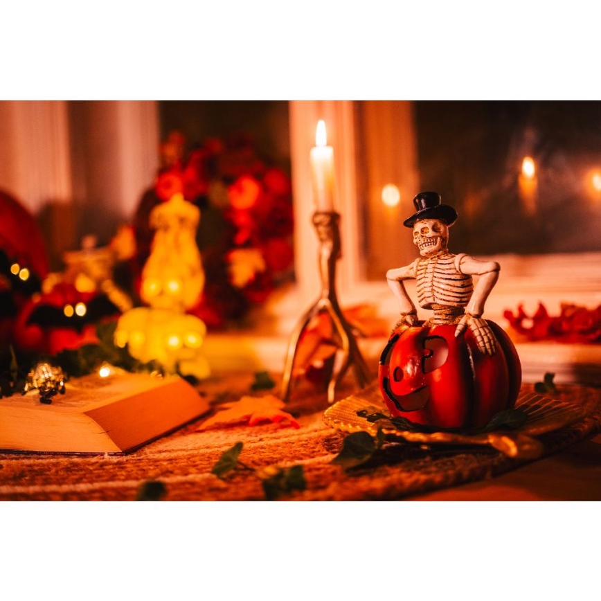 LED dekoracija HALLOWEEN LED/2xLR44/toplo bela okostnjak v bučni smoli