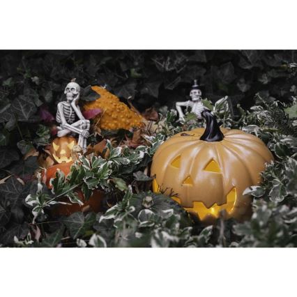 LED dekoracija HALLOWEEN LED/2xLR44/toplo bela okostnjak v bučni smoli