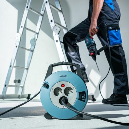 Retlux - Podaljšni kabel na kolutu 3 vtičnice, Tip E, 10 m, v modri/črni barvi