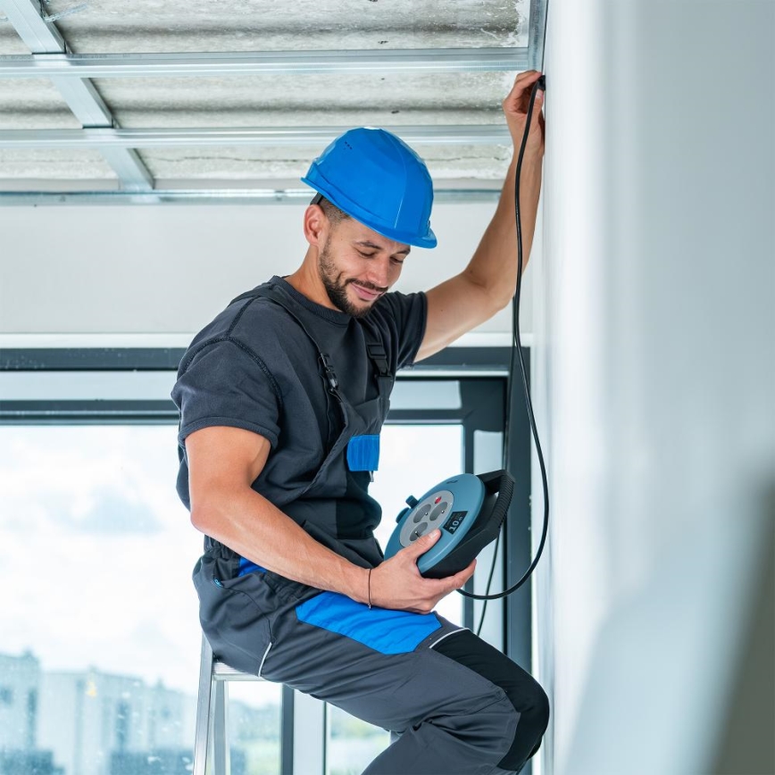 Retlux - Podaljšni kabel na kolutu 3 vtičnice, Tip E, 10 m, v modri/črni barvi