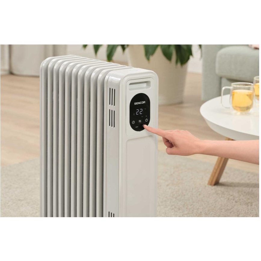 Sencor - Radiator napolnjen z oljem z 11 rebri 1000/2300W/230V bel + daljinski upravljalnik