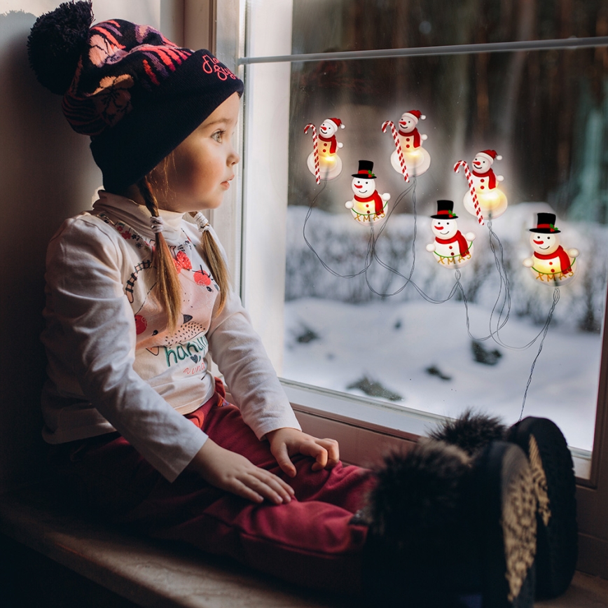 LED veriga z prisajalkami 6xLED/2xAA 1,2m topla bela snežak