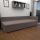 Tapecirana enojna postelja z univerzalnim vzglavjem in shranjevalnim prostorom AMSTERDAM 90x200 cm bež