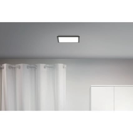 WiZ - LED Zatemnitvena stropna svetilka SUPERSLIM LED/12W/230V 2700-6500K Wi-Fi črna